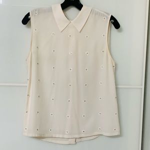 Selling Equipment sleeveless white top in size XS